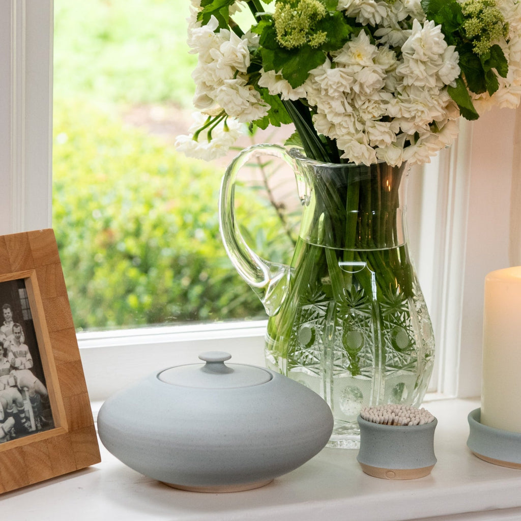 Hand thrown pottery urn