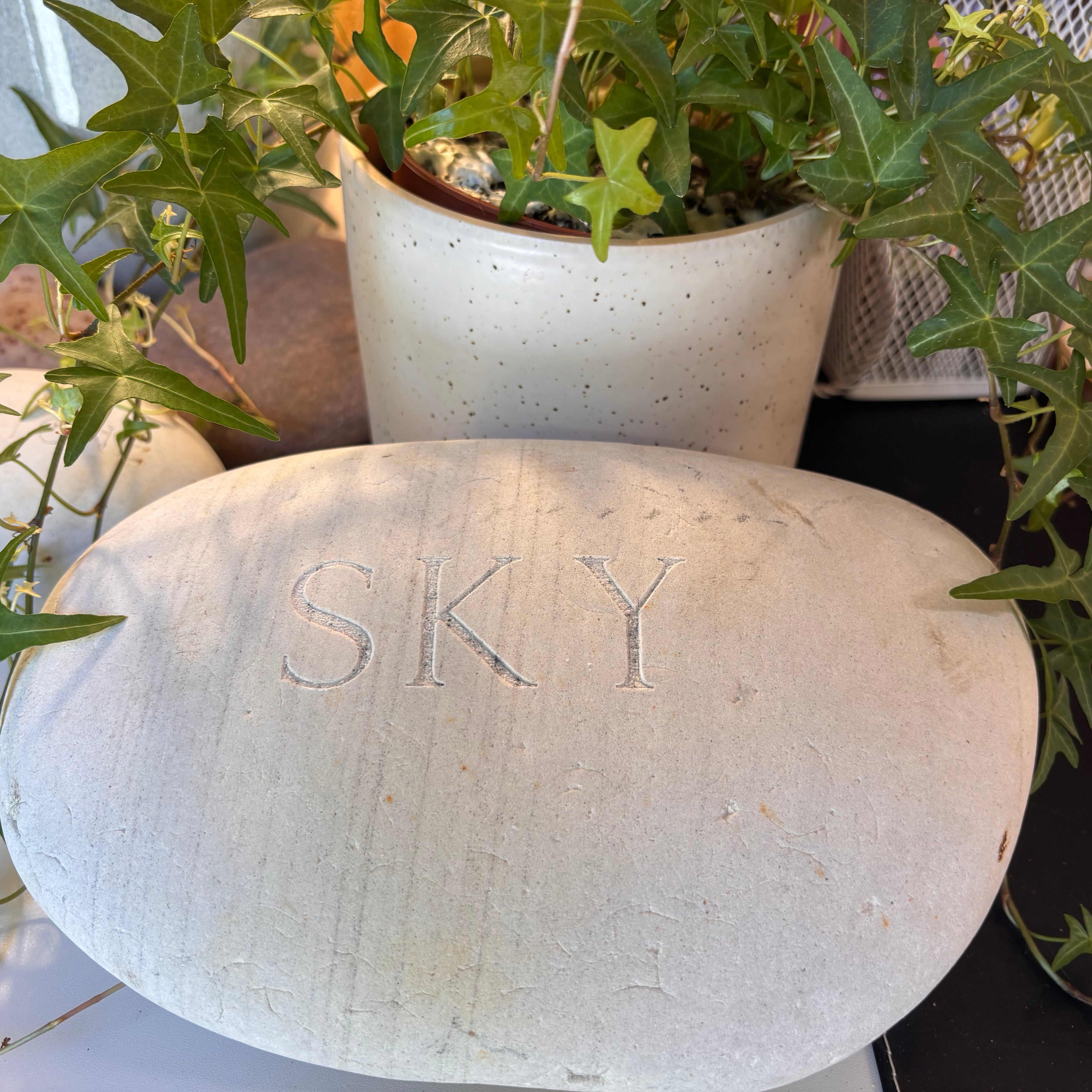 Memorial stone engraved with personalised message of loved ones name
